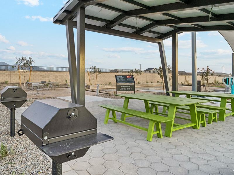 A table and chairs outside. A table and chairs outside.
