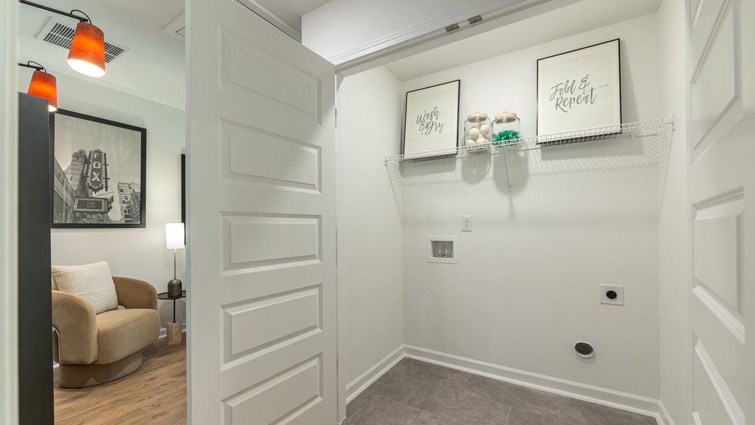 Furnished interior in a model home at Wellington Park in Lithonia (Image 34).