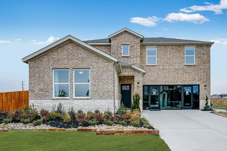 Front exterior of a home in the Parks at Foster Crossing community, located in Anna, TX (Image 3).