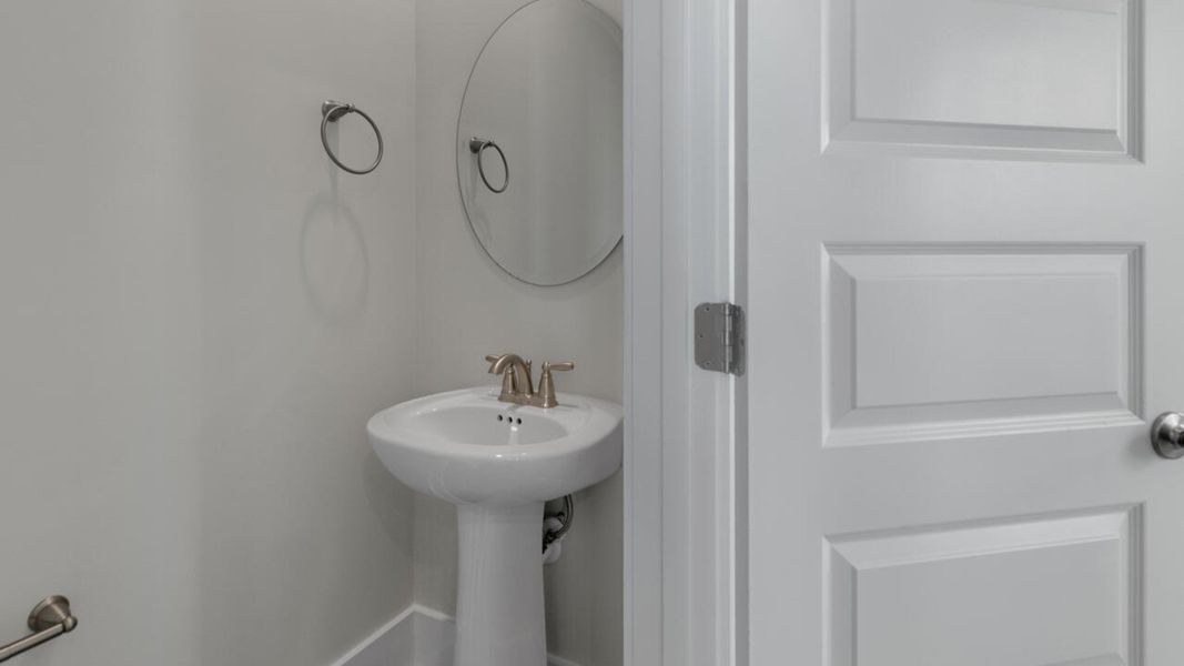 Furnished interior in a model home at Indigo Preserve Townhomes in Leland (Image 7).