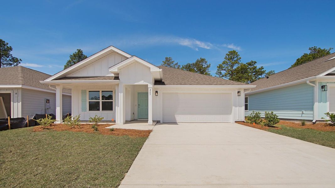 Front exterior of a home in the Ashton Park Phase III community, located in Freeport, FL (Image 9).