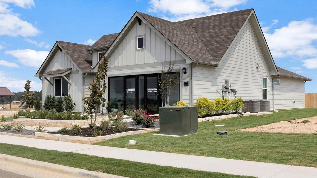 Front exterior of a home in the Cornerstone community, located in Rockdale, TX (Image 9).