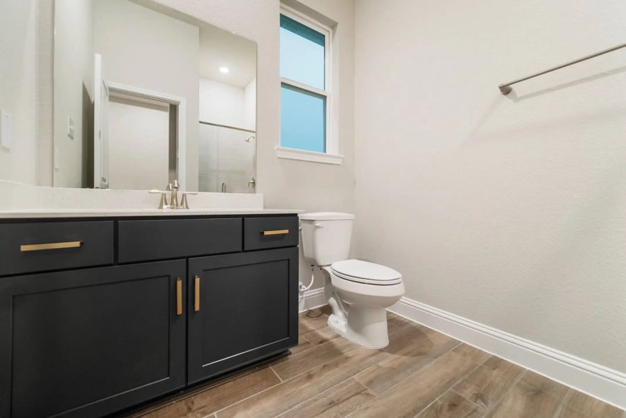 Furnished interior in a model home at Gatherings® at Chambers Creek: Duets in Willis (Image 12).