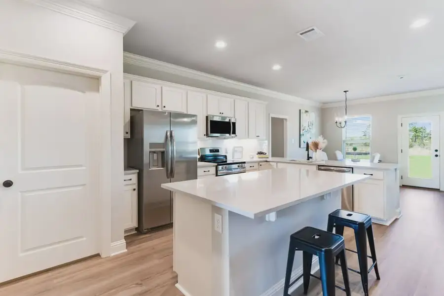 Furnished interior in a model home at Aldeana in Bonney (Image 6).