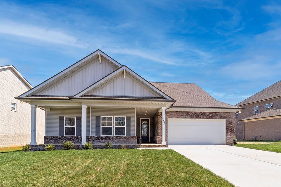 A house with a garage. A house with a garage.