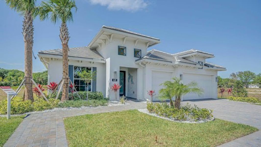 Front exterior of a home in the Lucaya Pointe community, located in Vero Beach, FL (Image 33).