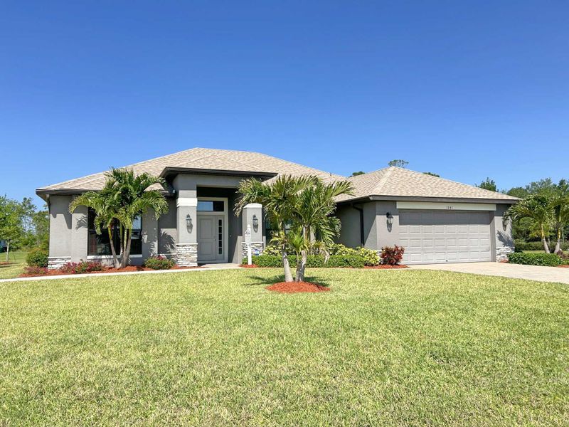 Front exterior of a home in the Deep Creek community, located in Punta Gorda, FL (Image 4).
