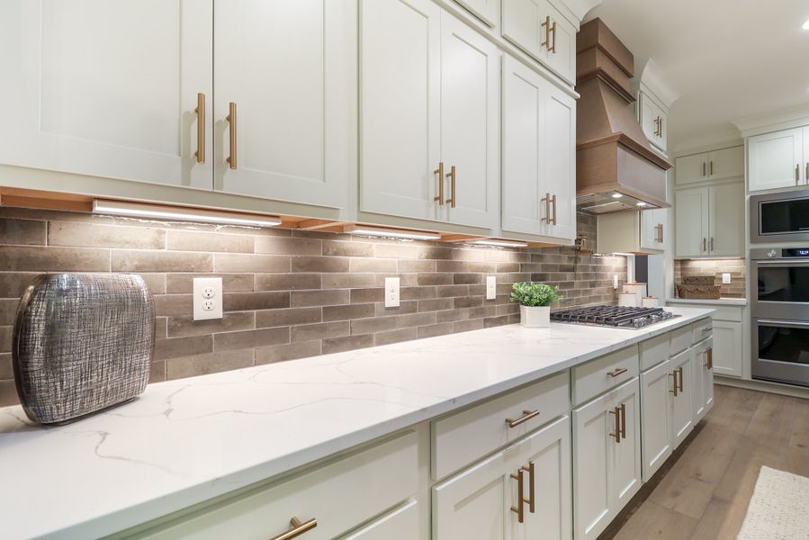 Furnished interior in a model home at St. Regis in Oxford (Image 11).