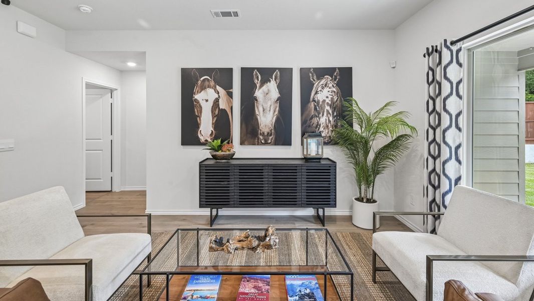 Furnished interior in a model home at Three Oaks in Sherman (Image 9).