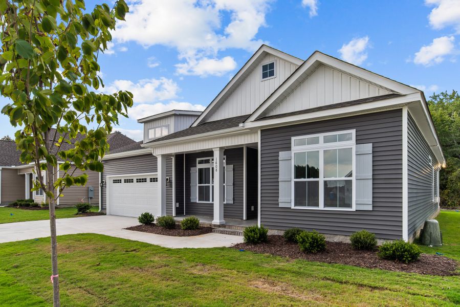 Front exterior of a home in the The Villas at Langston Farms community, located in Winterville, NC (Image 15).