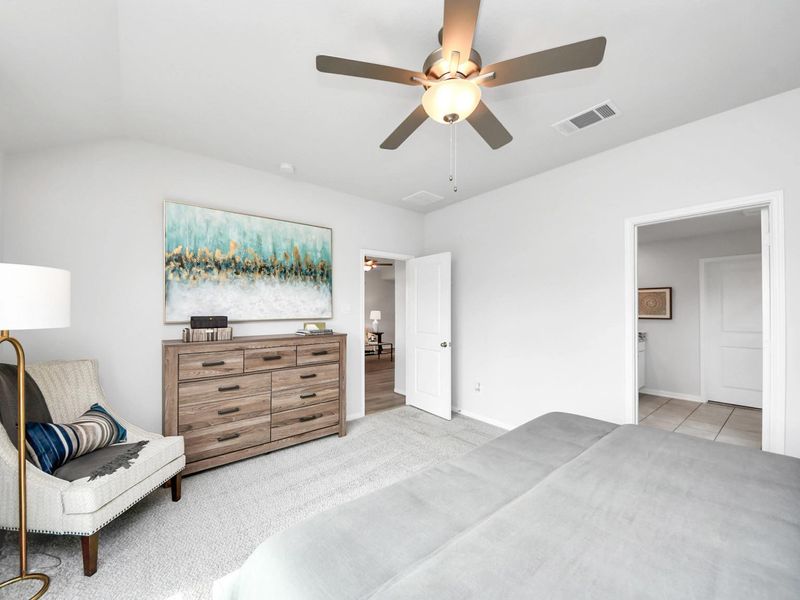 Furnished interior in a model home at Sunterra in Katy (Image 24).