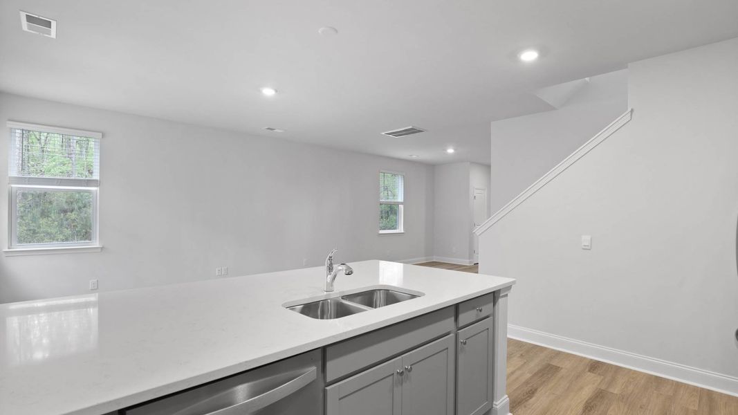 Furnished interior in a model home at Rivers Reach in Yemassee (Image 7).