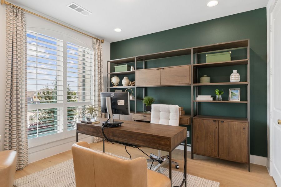 Furnished interior in a model home at Sweetgrass 65s in Haslet (Image 32).