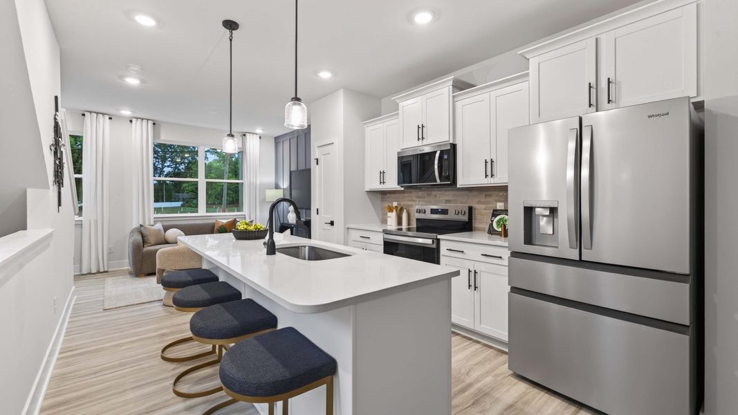 Furnished interior in a model home at Kingman Townhomes in Charlotte (Image 7).
