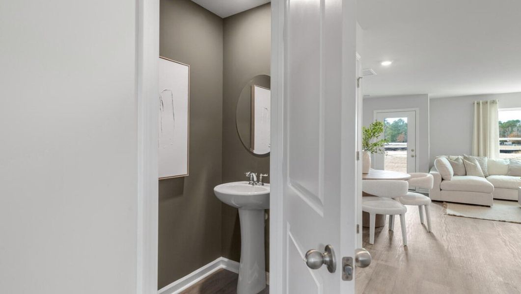 Furnished interior in a model home at Waterside Townhomes in Surf City (Image 15).