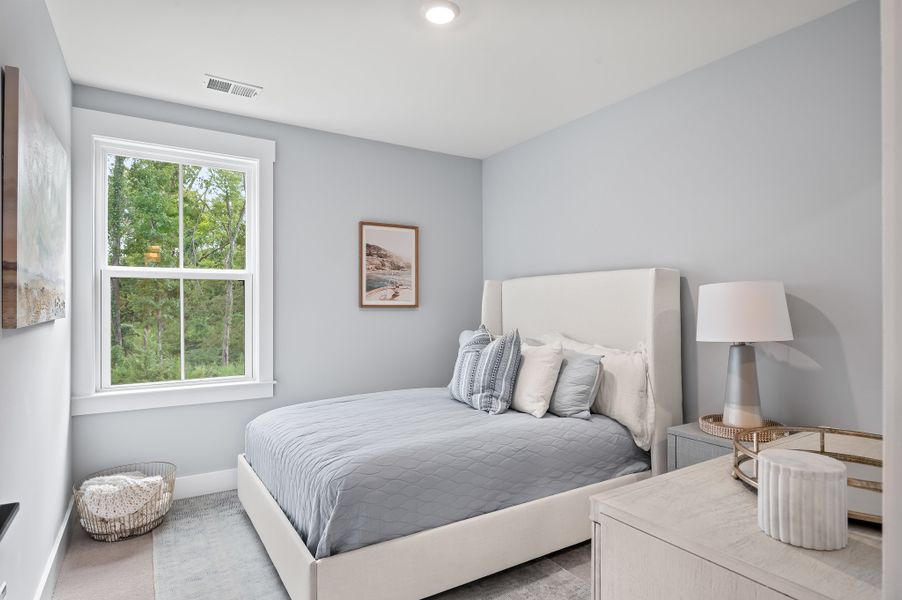 Furnished interior in a model home at Windward Townes in Goose Creek (Image 16).