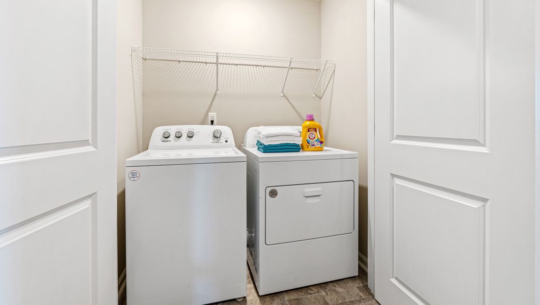 Furnished interior in a model home at Covington Village in Greer (Image 21).