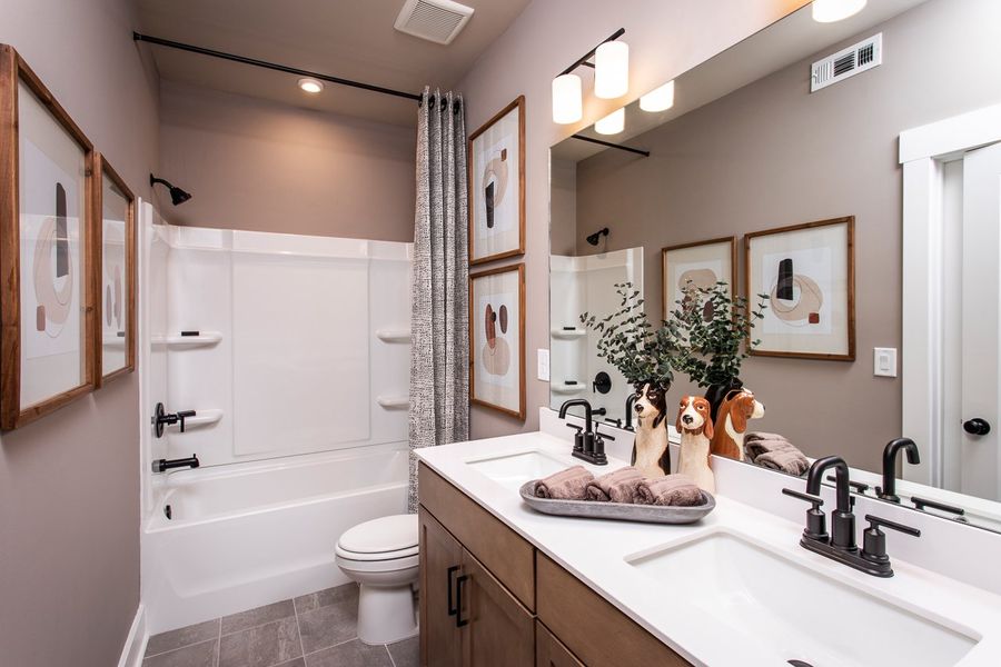 Furnished interior in a model home at Cambridge at Steels Bridge in Canton (Image 18).