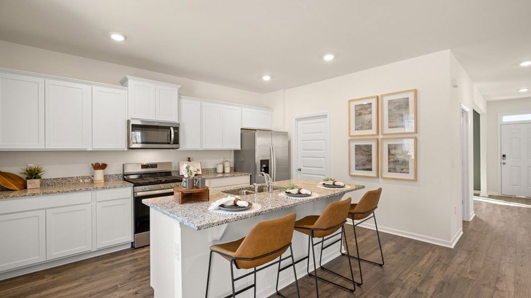 Furnished interior in a model home at Brooks Village in Dacula (Image 6).