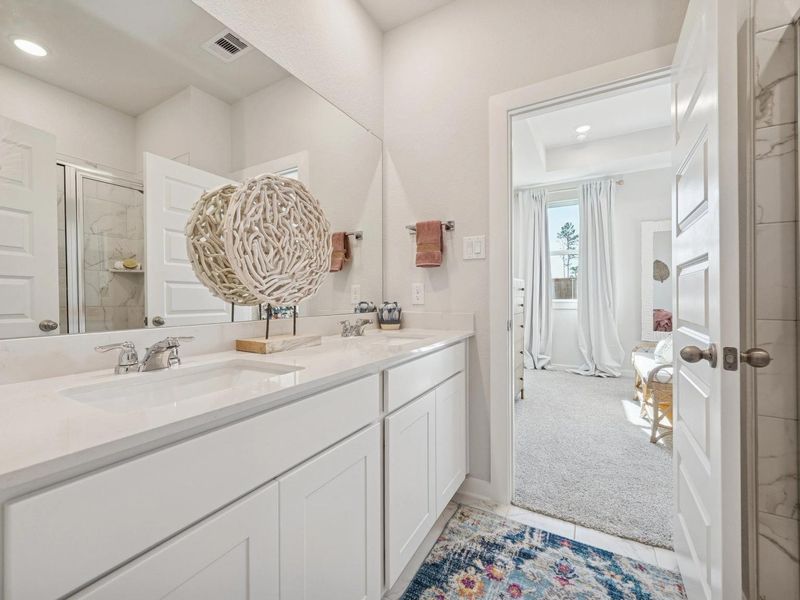 Furnished interior in a model home at Spring Branch Crossing in Conroe (Image 32).