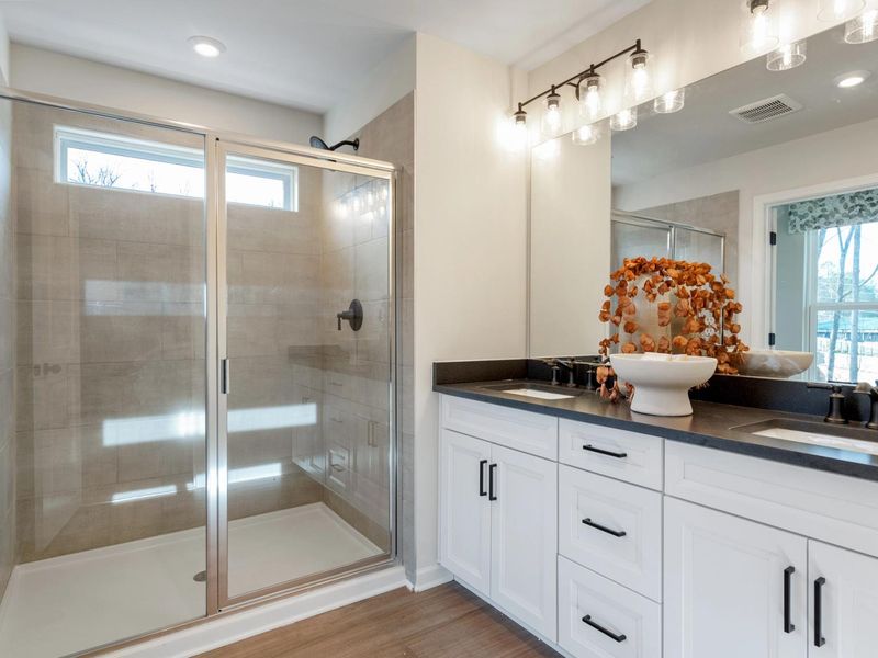 Furnished interior in a model home at Lake Shore in Winder (Image 7).