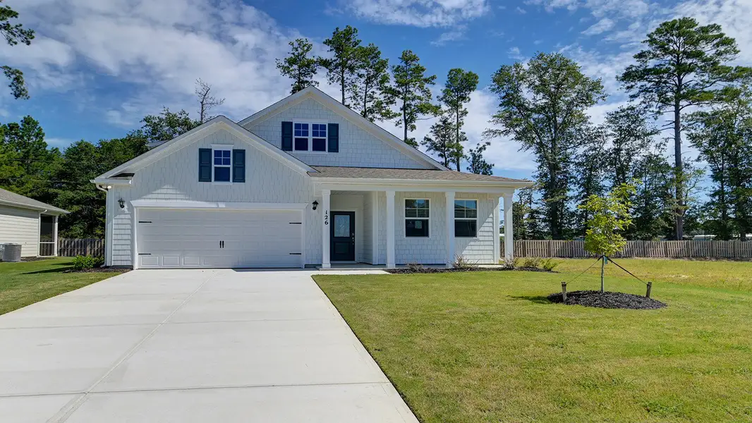 Front exterior of a home in the Sease's Pond community, located in Gilbert, SC (Image 1).
