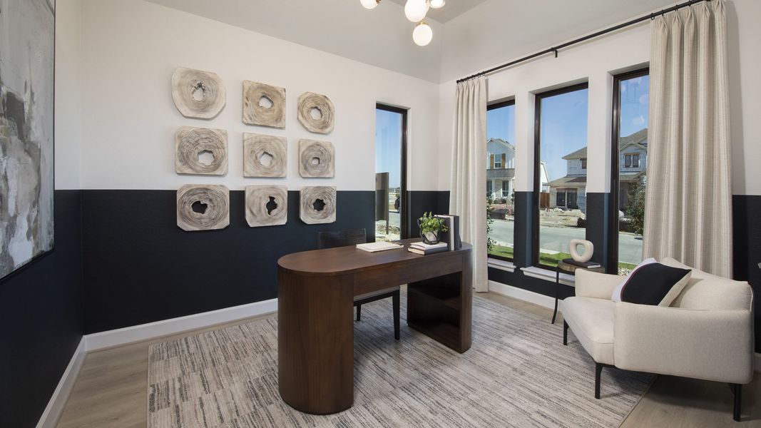 Furnished interior in a model home at Lariat 60' in Liberty Hill (Image 8).