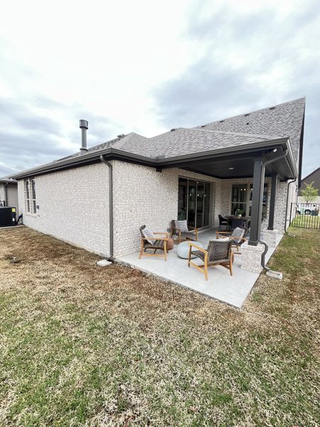 A charming brick patio home with cozy outdoor seating in Ladera Prosper by Ladera Texas (Prosper, TX). A charming brick patio home with cozy outdoor seating in Ladera Prosper by Ladera Texas (Prosper, TX).