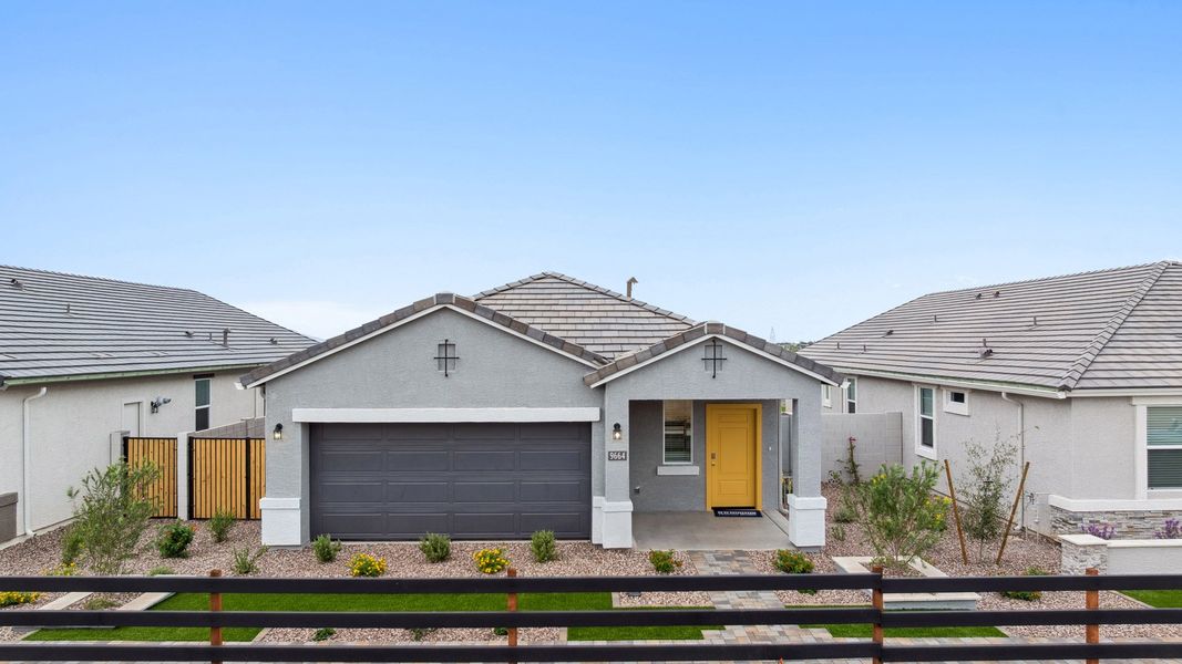 Front exterior of a home in the Radiance at Superstition Vistas community, located in Apache Junction, AZ (Image 3).