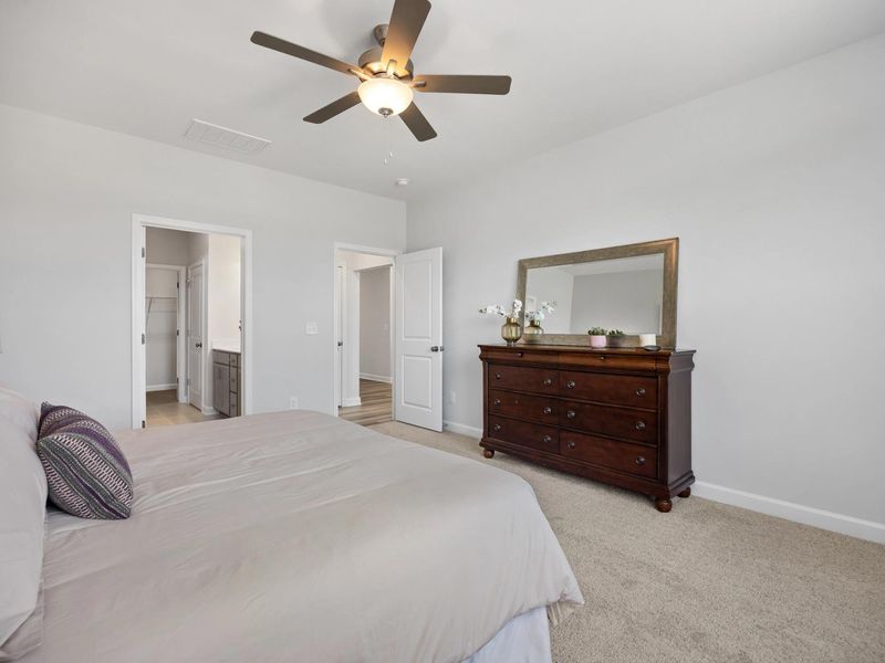 Furnished interior in a model home at Woodland Crossing in Zebulon (Image 16). Furnished interior in a model home at Woodland Crossing in Zebulon (Image 16).