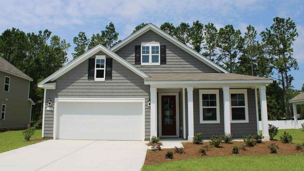 Front exterior of a home in the The Forest at Black Bear community, located in Longs, SC (Image 10).