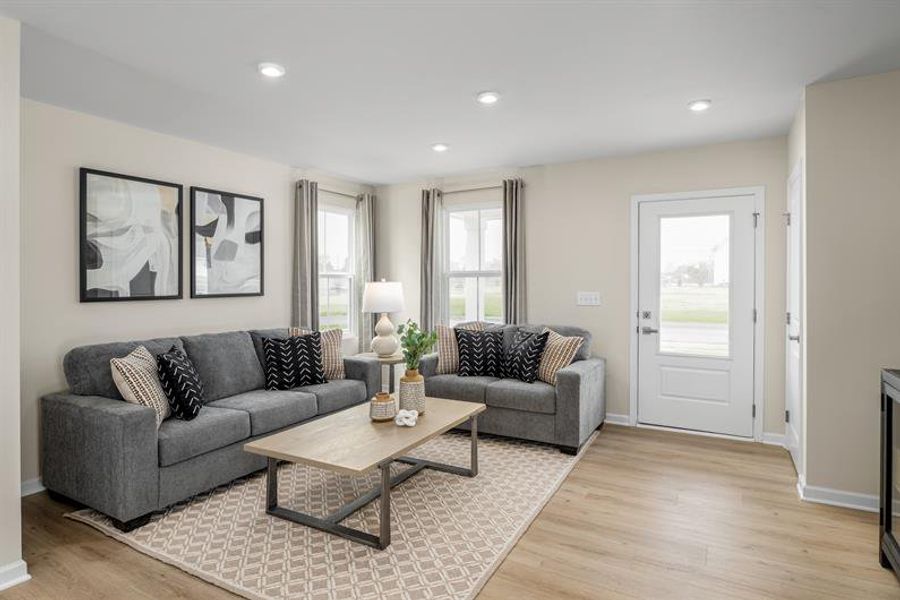 Bright, open living spaces designed to bring family and friends together in the heart of the home Bright, open living spaces designed to bring family and friends together in the heart of the home