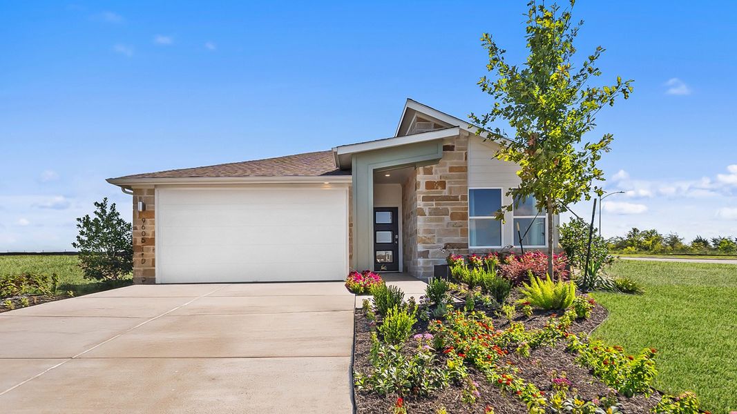 Front exterior of a home in the Trails at Wildhorse community, located in Austin, TX (Image 2).