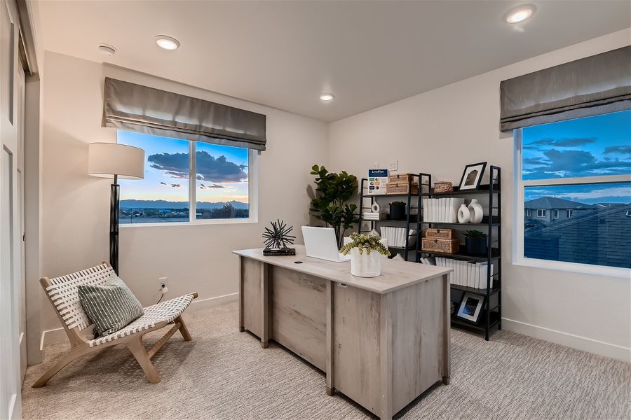 Furnished interior in a model home at Parkway at Prairie Center Village in Brighton (Image 3).