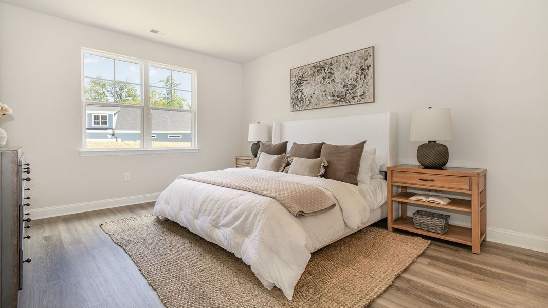 Furnished interior in a model home at The Reserve at Wild Horse in Conway (Image 12).