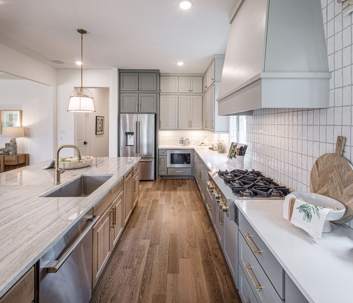 Furnished interior in a model home at The Highlands in Porter (Image 31).