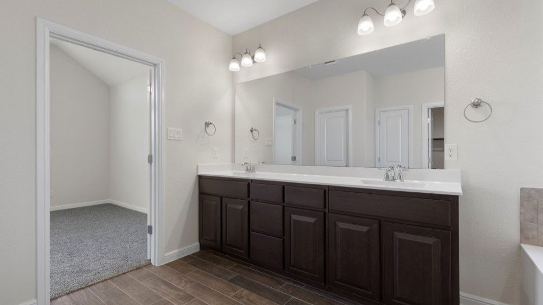 Furnished interior in a model home at Eden Ranch in Arlington (Image 18).