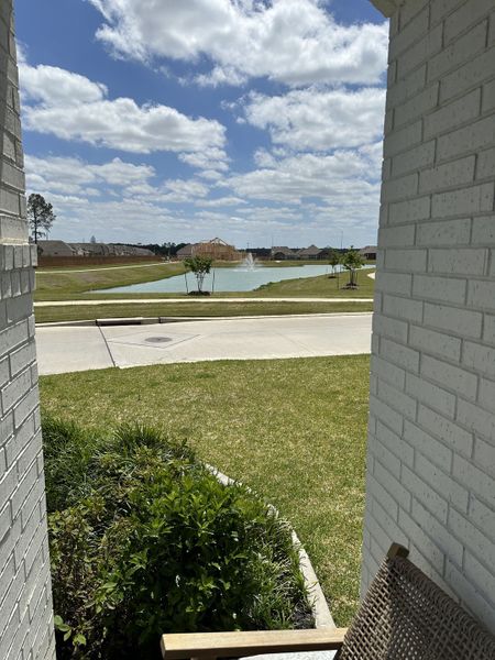 Serene pond view with lush greenery in Wood Leaf Reserve 40’ by Shea Homes, Tomball, TX. Serene pond view with lush greenery in Wood Leaf Reserve 40’ by Shea Homes, Tomball, TX.