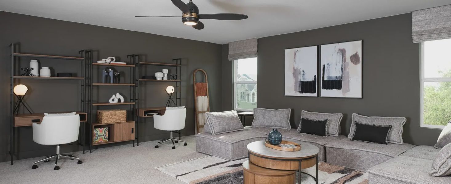 Furnished interior in a model home at Berry Creek Highlands in Georgetown (Image 12).