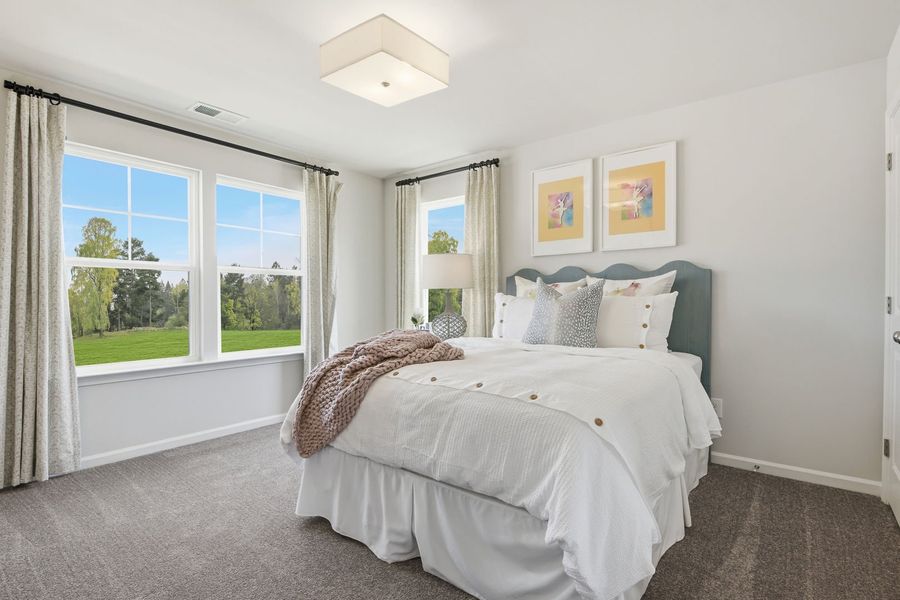 Furnished interior in a model home at Clairmont in Charlotte (Image 22).