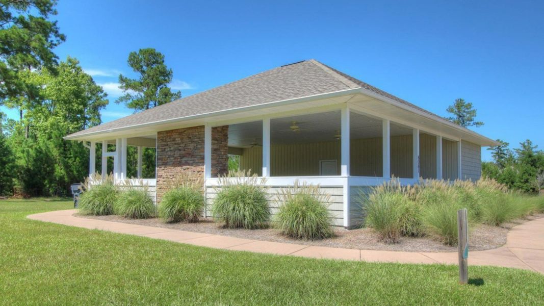 Front exterior of a home in the Townes at Seabrooke community, located in Leland, NC (Image 12).
