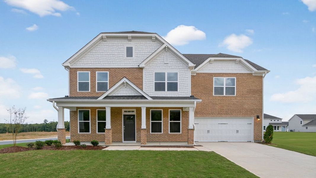 Front exterior of a home in the Eagle Creek community, located in Fuquay Varina, NC (Image 15).