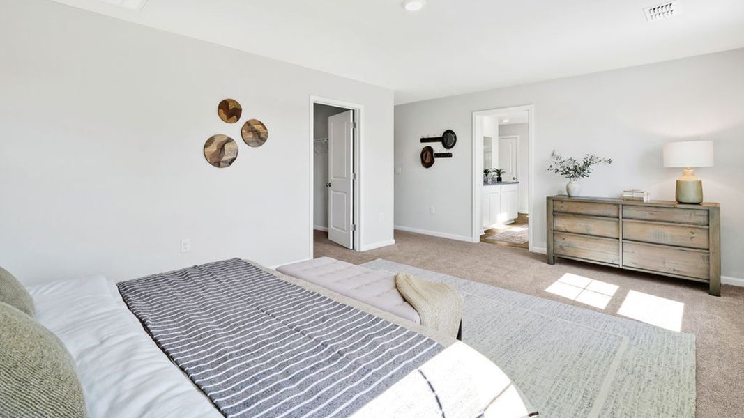 Furnished interior in a model home at Bella Point in Bolivia (Image 17).