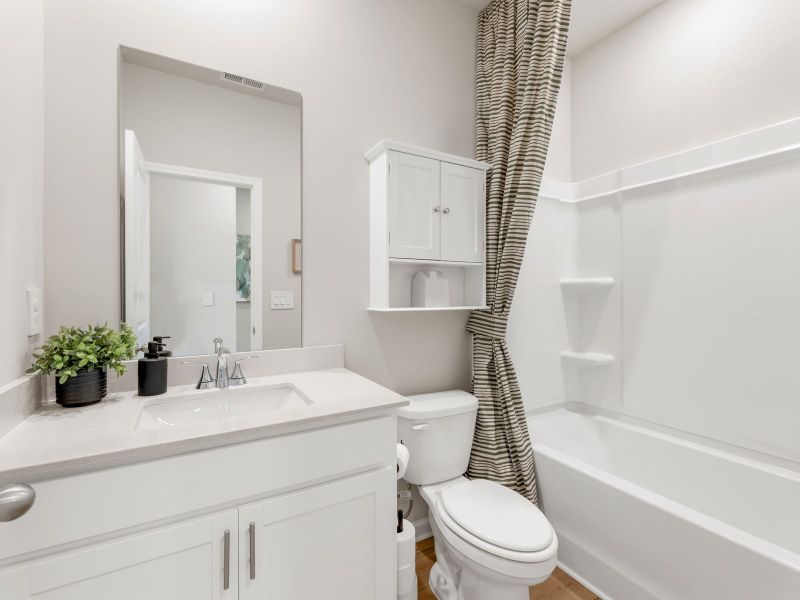 Furnished interior in a model home at Northwoods at Mirror Lake in Villa Rica (Image 10).