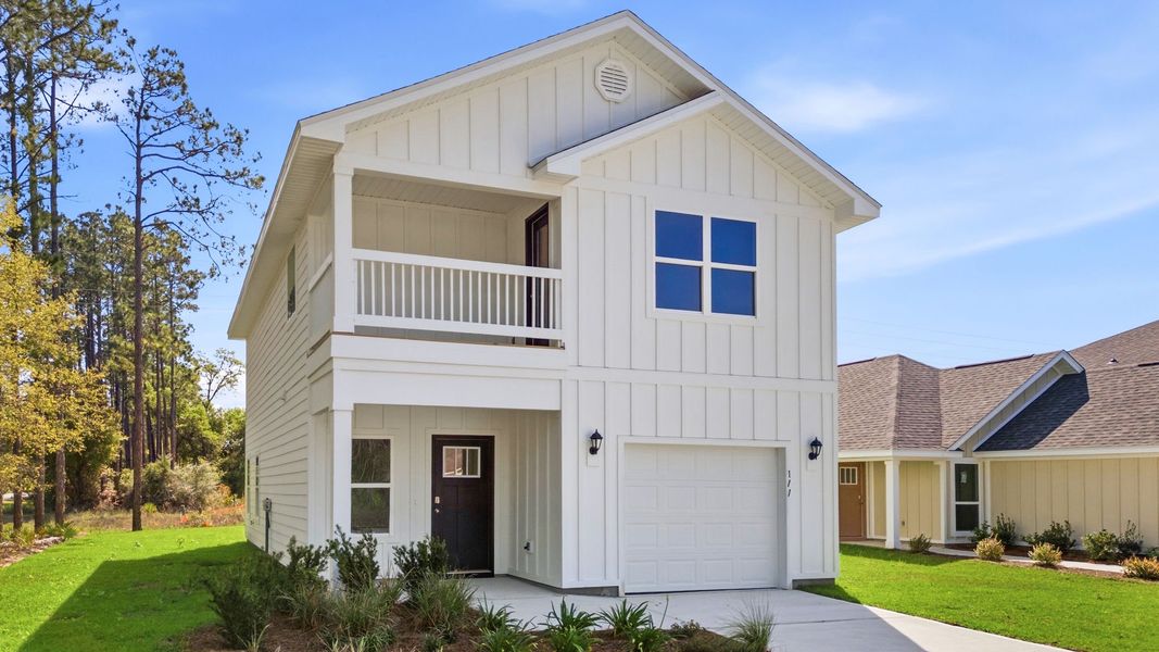 Front exterior of a home in the Chateau Nemours community, located in Port Saint Joe, FL (Image 3).