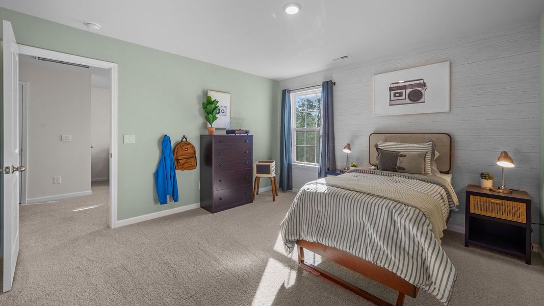 Furnished interior in a model home at Bedford Place in Wilson (Image 8).