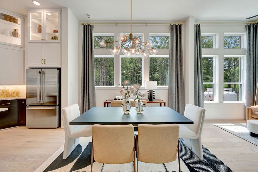 Furnished interior in a model home at The Highlands Encore - Harbor Collection in Porter (Image 9). Furnished interior in a model home at The Highlands Encore - Harbor Collection in Porter (Image 9).