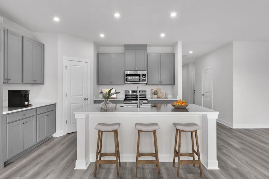 Expansive kitchen with large island Expansive kitchen with large island