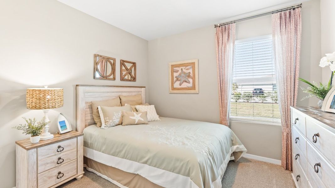 Furnished interior in a model home at Cove at West Port - Tradition in Port Charlotte (Image 27).