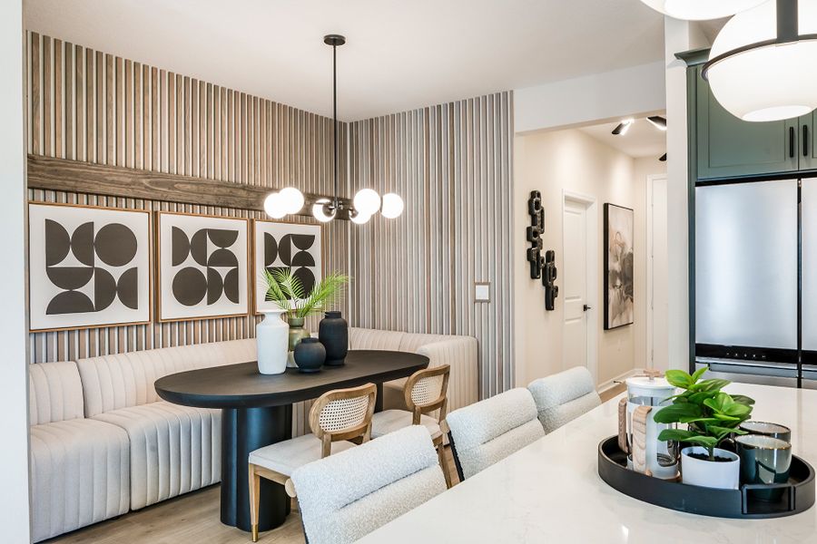 Furnished interior in a model home at Aulin Square in Oviedo (Image 5).
